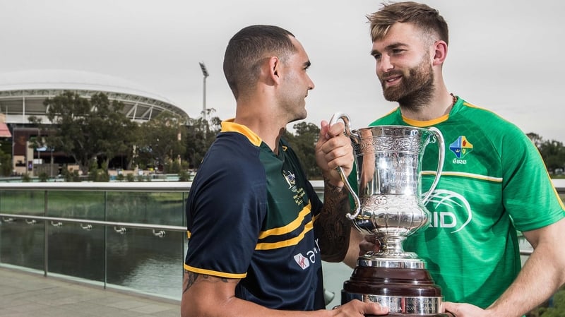 Australia's Shaun Burgoyne with Aidan O'Shea of Ireland