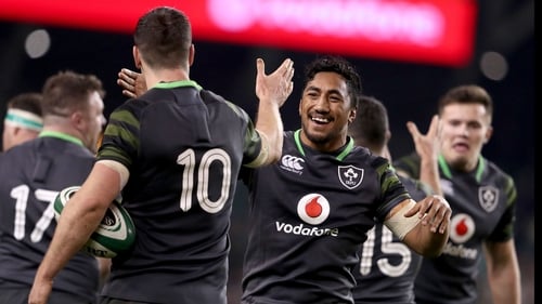 Bundee Aki celebrates with Jonathan Sexton after the game