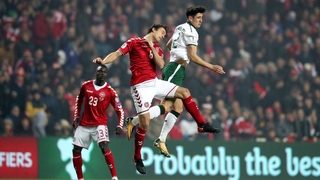 Callum O'Dowda rises with Thomas Delaney of Denmark