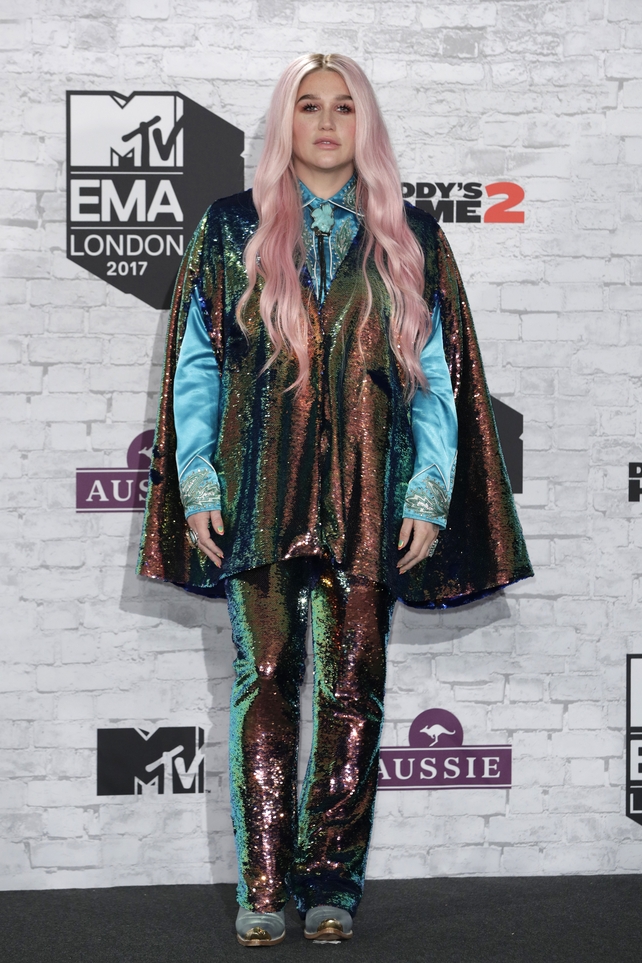 Performing a song from her latest album 'Rainbow', Kesha wore multi-coloured sequined trousers and matching cape.