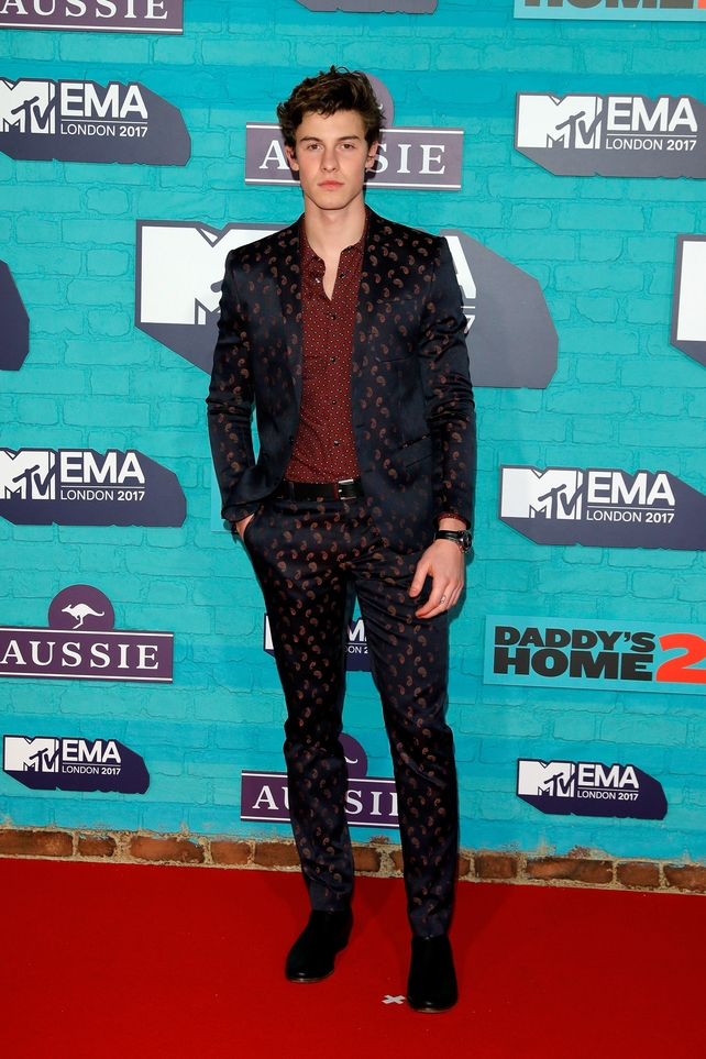 Shawn Mendes wore a The Kooples Bespoke suit.