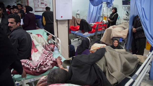 Victims receive treatment in a hospital following the earthquake in Sarpol-e Zahab in Kermanshah