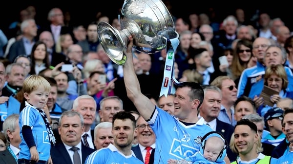 Bastick celebrates winning Sam with his children