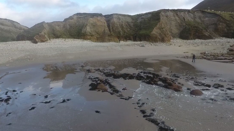 The beach is nestled below picturesque white cliffs in a prime scenic location