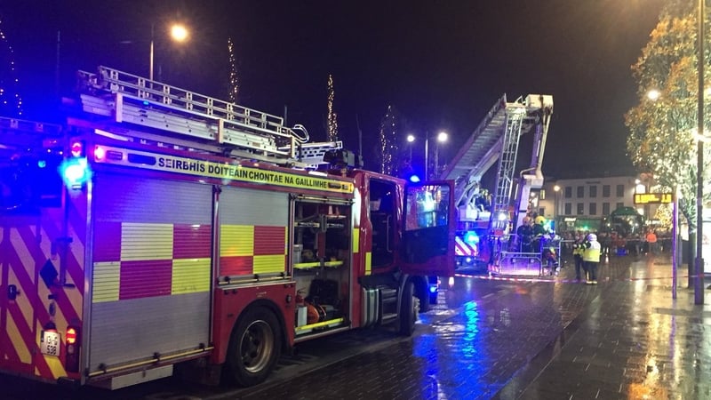 Fire service personnel used cherry pickers to access some of the cabins