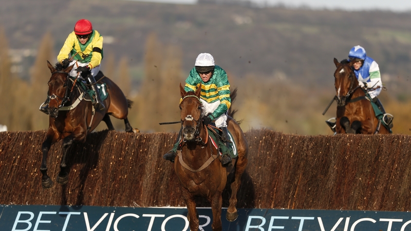 Bryan Cooper on Finian's Oscar (L) clear the last en route to victory