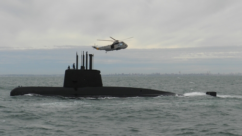 Over a dozen boats and planes are taking part in the search for the missing submarine