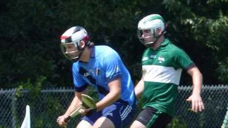 Michael Walsh (R) formed a hurling club in America