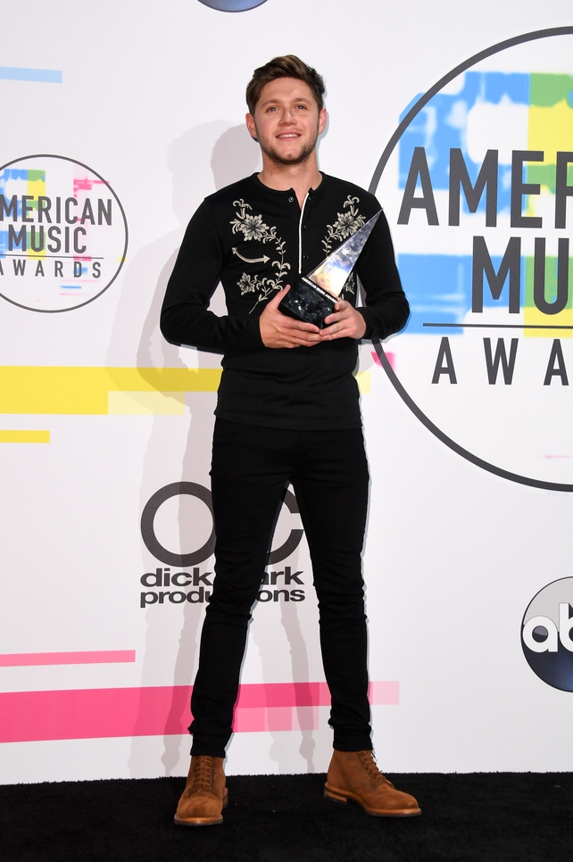 Our very own Niall Horan brought home the American Music Award for New Artist of the Year. The Mullingar man wore an embroidered black top for his performance.