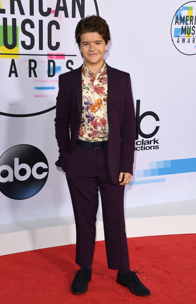 Stanger Things actor Gaten Matarazzo an ASOS ensemble and Aldo shoes.