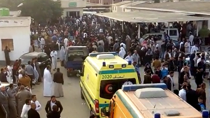 Crowds and ambulances outside the Al Rawdah mosque in Egypt's north Sinai