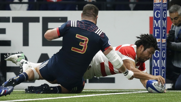 Shota Horie of Japan scores their first try