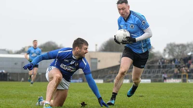 Stephen Moran of Simonstown gets away from Ken Casey