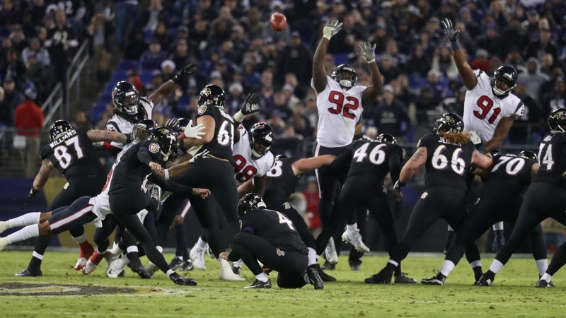 Justin Tucker kicks a field goal for the Baltimore Ravens