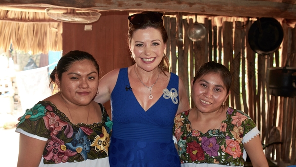 Catherine Fulvio with a Mayan family
