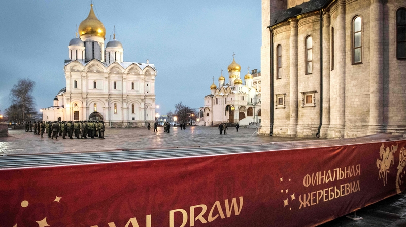 Servicemen practice at the Kremlin in Moscow on the eve of the draw