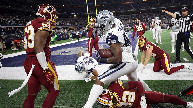 Rod Smith of the Dallas Cowboys runs the ball out of bounds