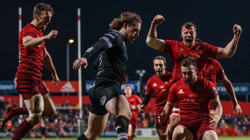 Munster's Darren Sweetnam, Robin Copeland and JJ Hanrahan celebrate Rory Scannell's try