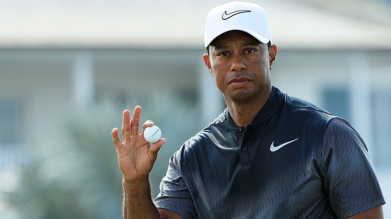 Woods is 10 off the lead