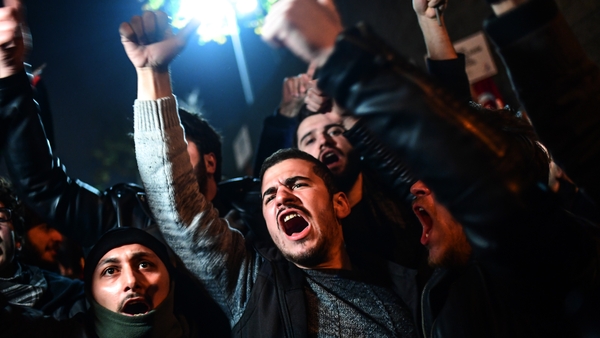 Protesters demonstrate against the US and Israel in front of the US consulate in Istanbul