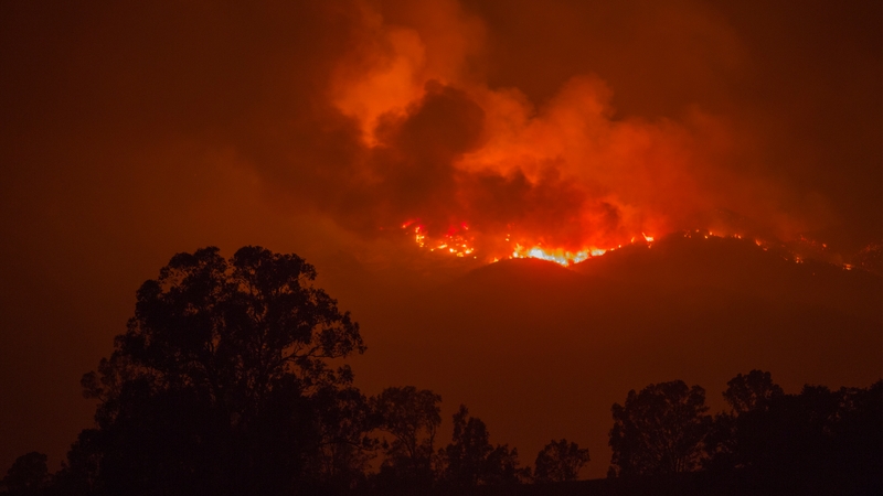 Nearly 9,000 firefighters have been battling the major blazes since Monday