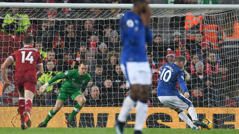 Wayne Rooney scores from the penalty spot
