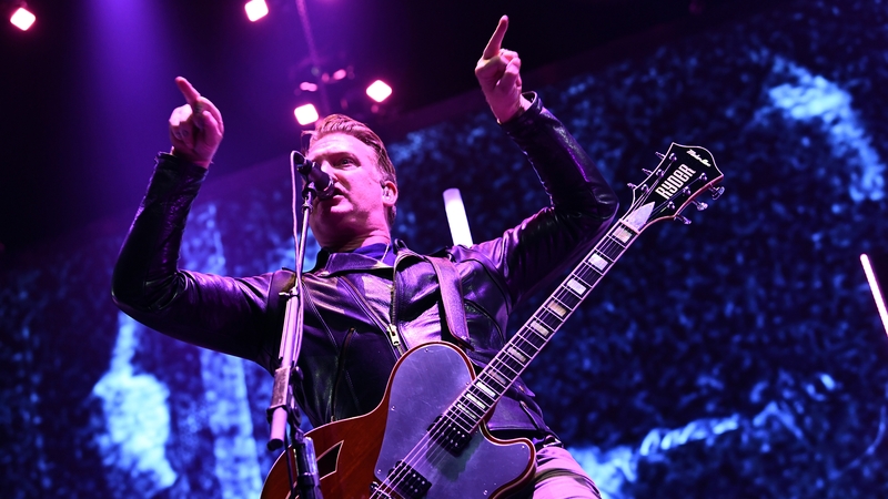 Josh Homme onstage at the Forum in Inglewood, California on Saturday - "I was a total d***, and I'm truly sorry"