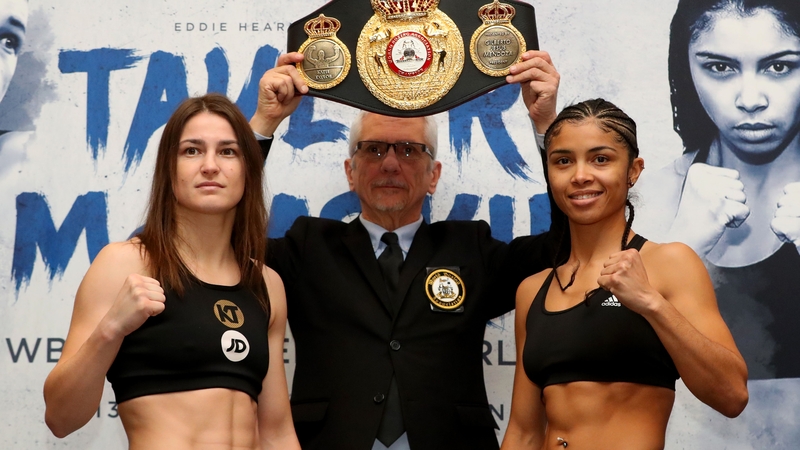 Katie Taylor (L) and Jessica McCaskill at today's weigh-in for their title bout