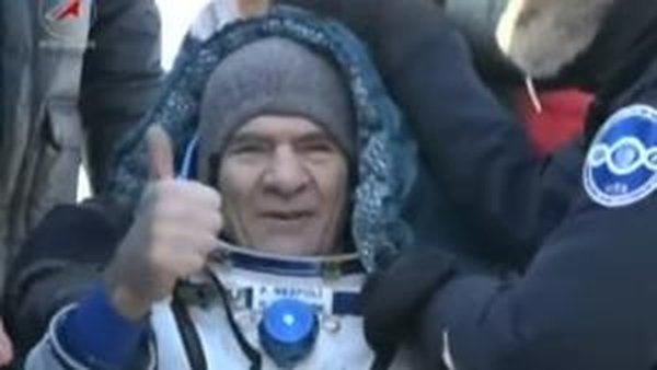 Paolo Nespoli gives a thumbs up after being taken from the Soyuz capsule (pic: ESA)