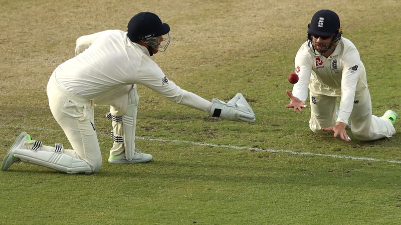Mark Stoneman and Jonny Bairstow of England drop Shaun Marsh of Australia