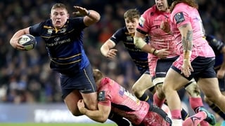 Leinster's Tadhg Furlong tackled by Matt Kvesic of Exeter