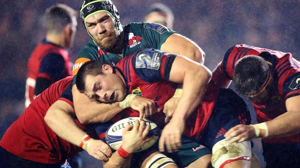 Munster's CJ Stander with Graham Kitchener of Leicester