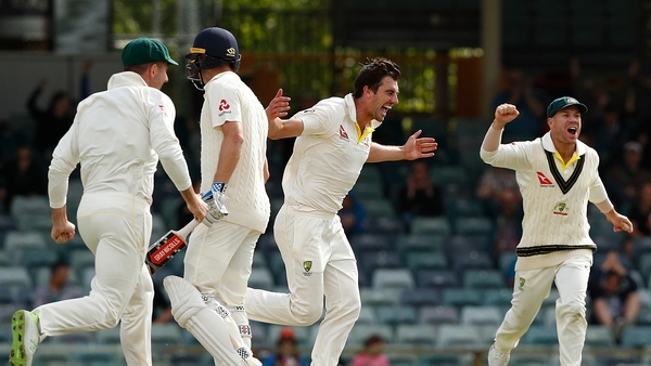 Pat Cummins of Australia celebrates the wicket of Chris Woakes