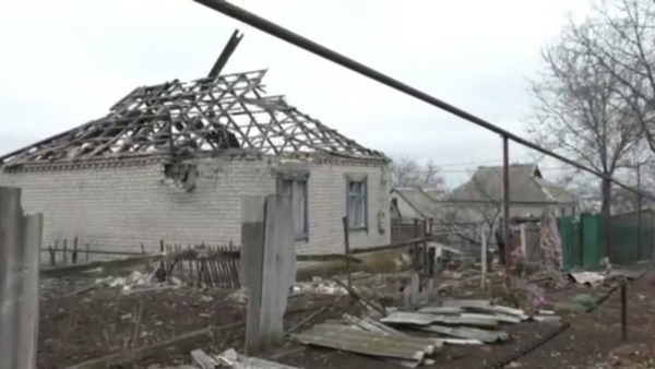 Home damaged by rocket fire in Novoluhanske in eastern Ukraine