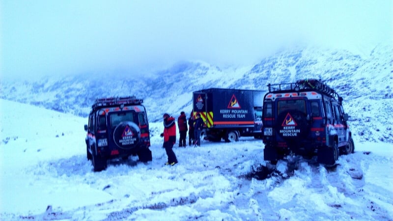 Kerry Mountain Rescue Team said conditions on the mountain were "very challenging" with waist deep snow drifts and very poor visibility