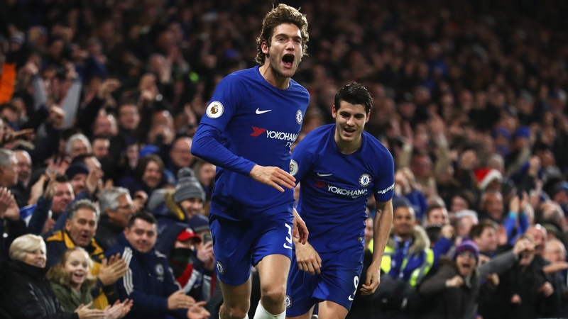 Marcos Alonso celebrates his goal with Alvaro Morata against Brighton.