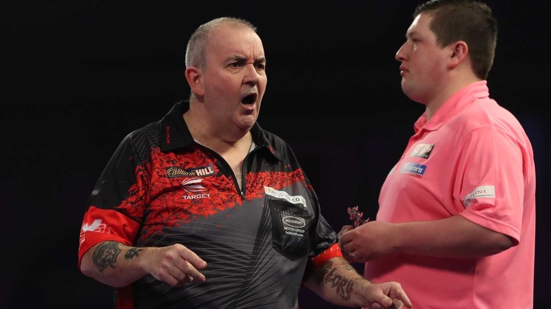 Phil Taylor eased past Keegan Brown