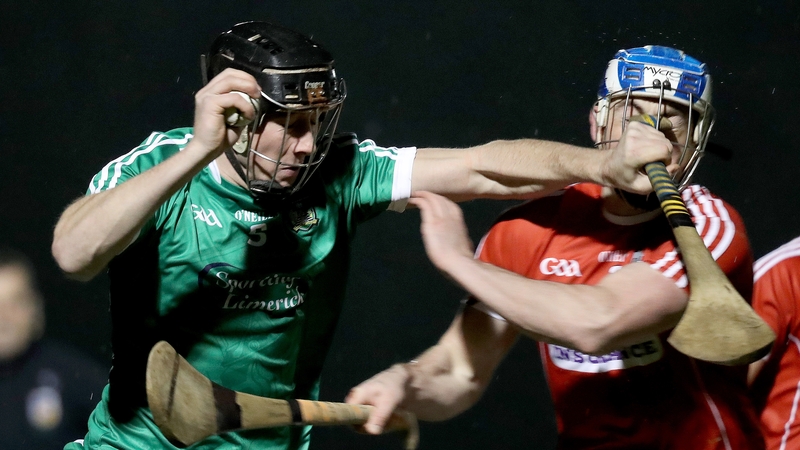 Limerick's Diarmaid Byrnes with Sean O'Donoghue of Cork