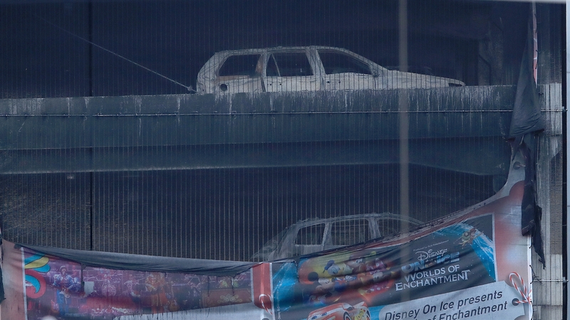 The charred vehicles remain at the multi-storey car park