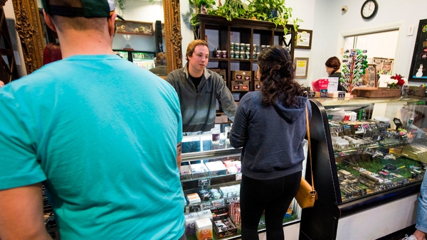 Customers at the Higher Path marijuana dispensary in the San Fernando valley area of LA