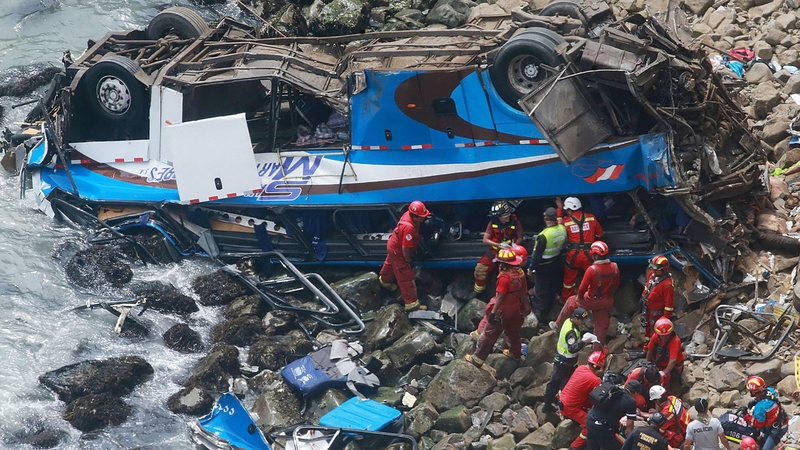The bus dropped 100 metres and landed upside down on rocks at the edge of the sea