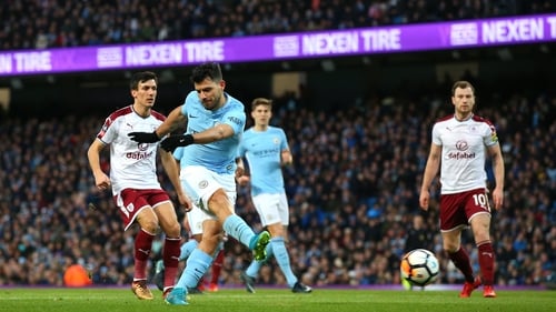 Sergio Aguero scores the first goal against Burnley at the Etihad Stadium