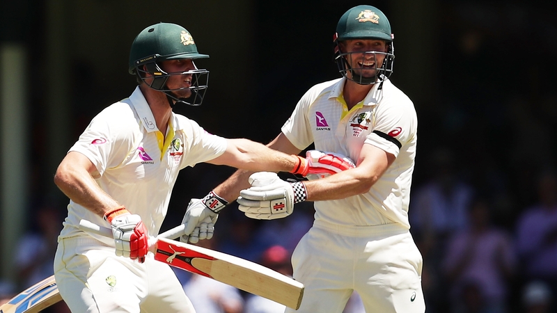 Mitchell Marsh celebrates with his brother Shaun Marsh of Australia