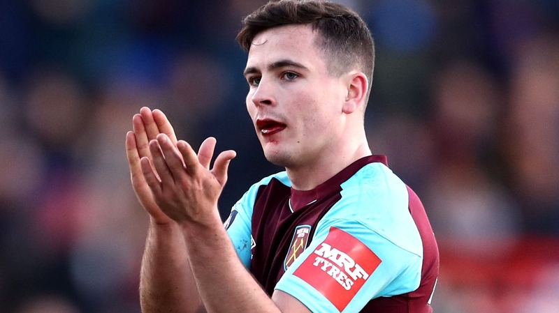A bloodied Josh Cullen salutes the fans
