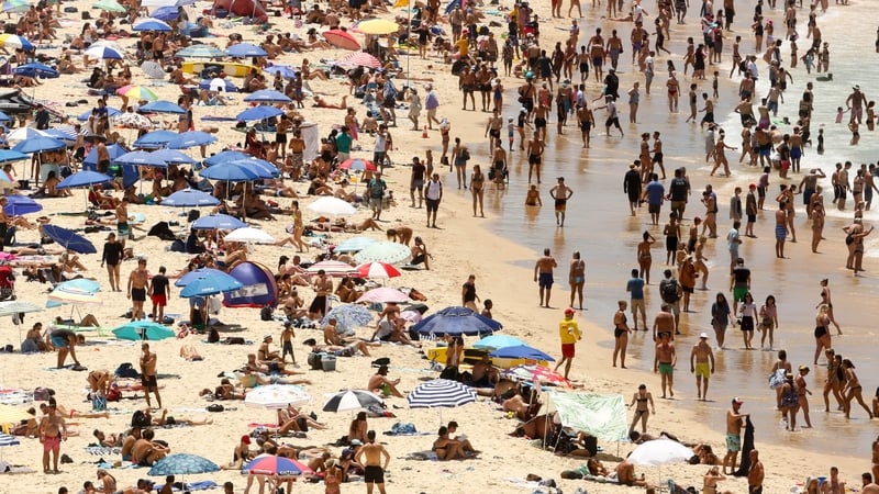 Sun-seekers descend on Bondi beach in Sydney, Australia