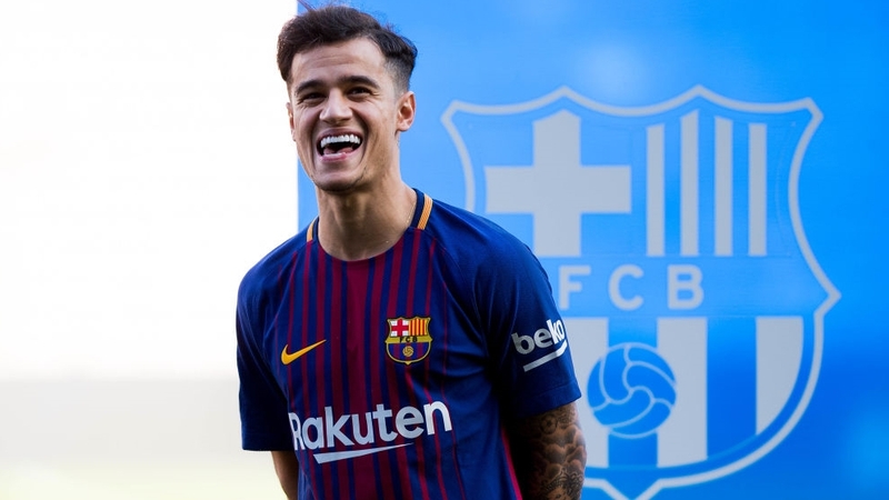 Philippe Coutinho posing in his new Barcelona shirt