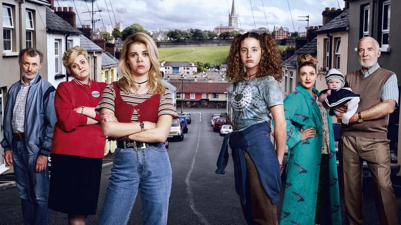 Derry Girls - Tara Lynne O'Neill, as Mary Quinn, third left, with Tommy Tiernan as her husband Gerry (far left)