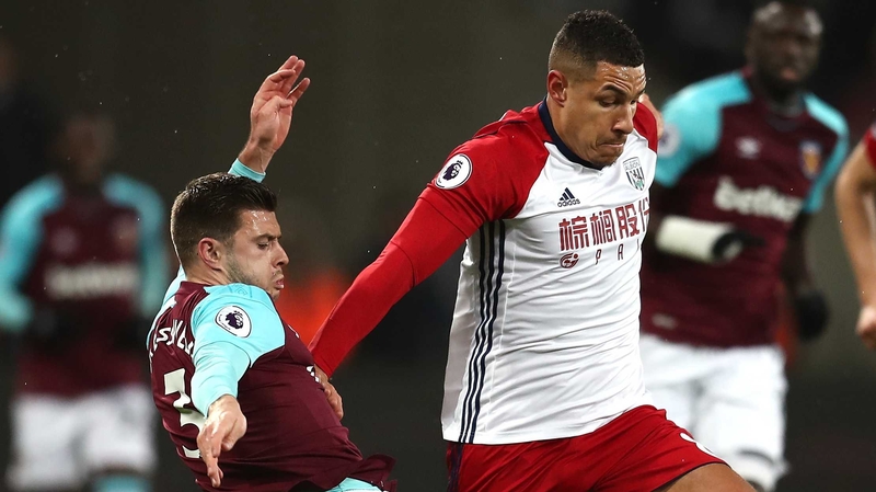 Jake Livermore (R) in actin against West Ham