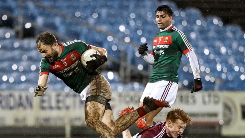 Mayo's Jason Gibbons with Peter Cooke of Galway