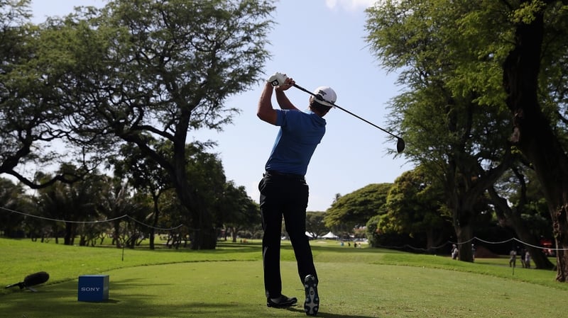 Charles Howell III plays his shot from the eighth tee at Waialae Country Club